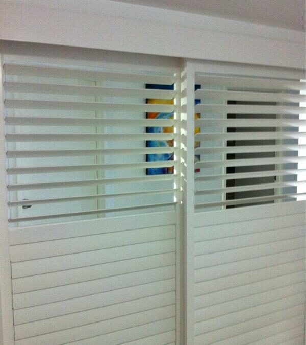 Basswood Shutters 89mm Louvre, Sliding as a room divider in Ballina